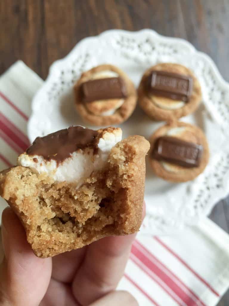 Campfire S'mores Cups are the perfect summertime treat that transitions into fall. Melted chocolate, toasty marshmallows and a wonderful graham cracker cookie make up this delicious dessert!