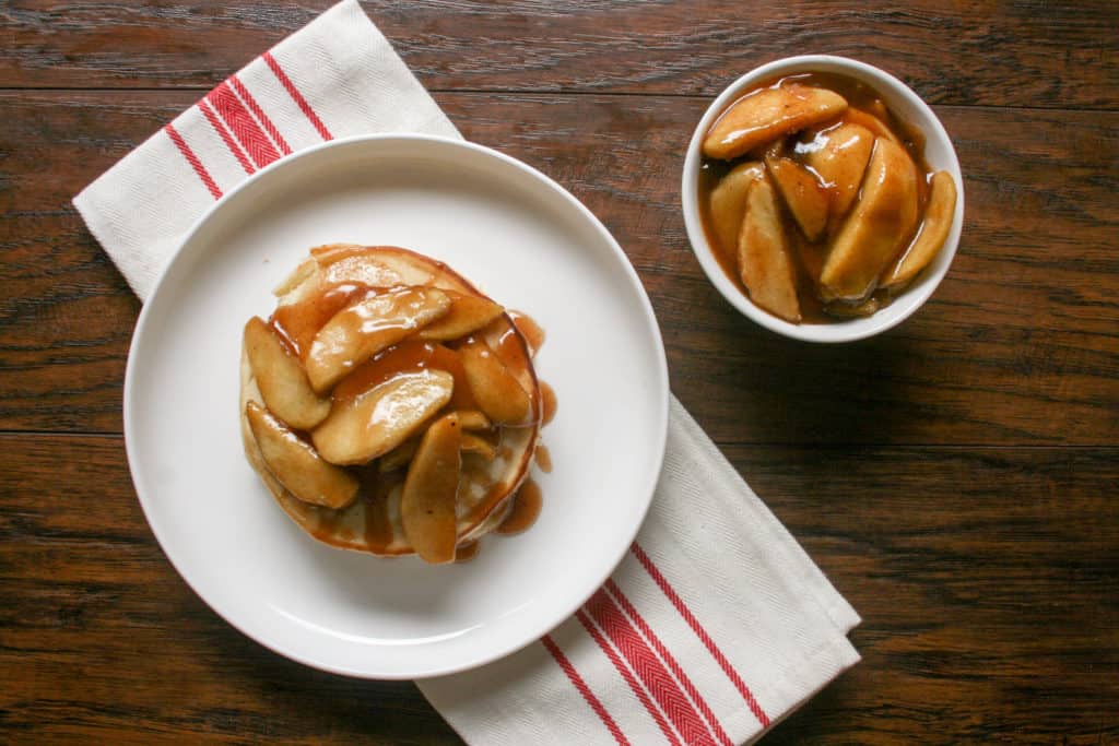 Pancakes with autumn apple topping is the perfect breakfast for fall! Sweet, light an airy, no need for syrup on these!