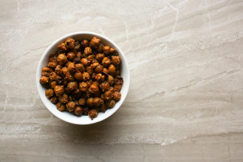 Crunchy roasted chickpeas are the perfect healthy snack or topping for a salad!