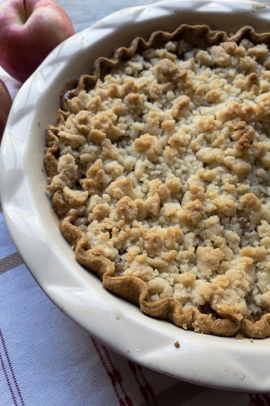 A classic, Thanksgiving day Apple Crumble Pie. Tart apples, lots of cinnamon sugar, and buttery, sugary topping! So delicious!