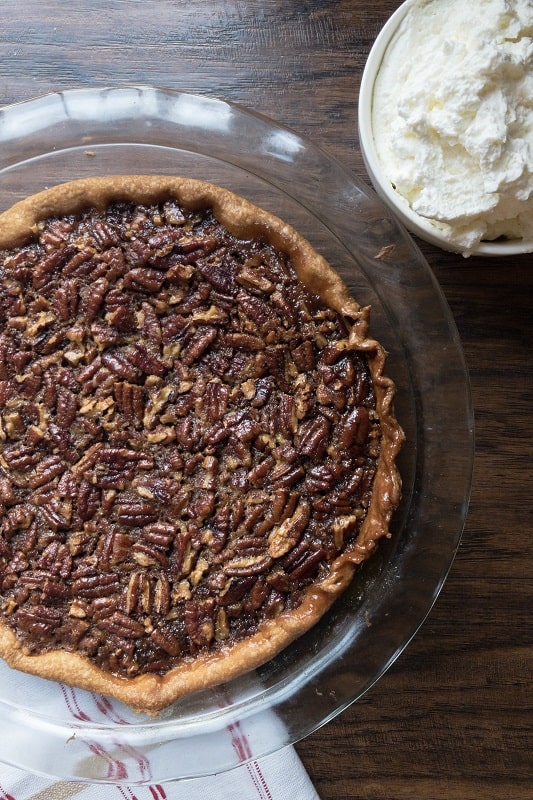 A good old fashioned Classic Pecan Pie with Homemade Whipped Cream to grace your Thanksgiving dessert table!