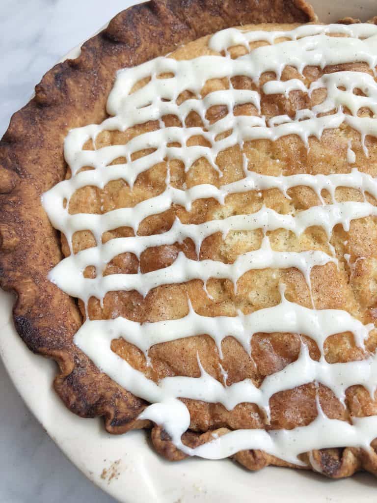 Cinnamon Sugar Snickerdoodle Pie is just like a jumbo Snickerdoodle cookie.  Cinnamon sugar goodness inside a buttery crust topped with a delicious glaze!