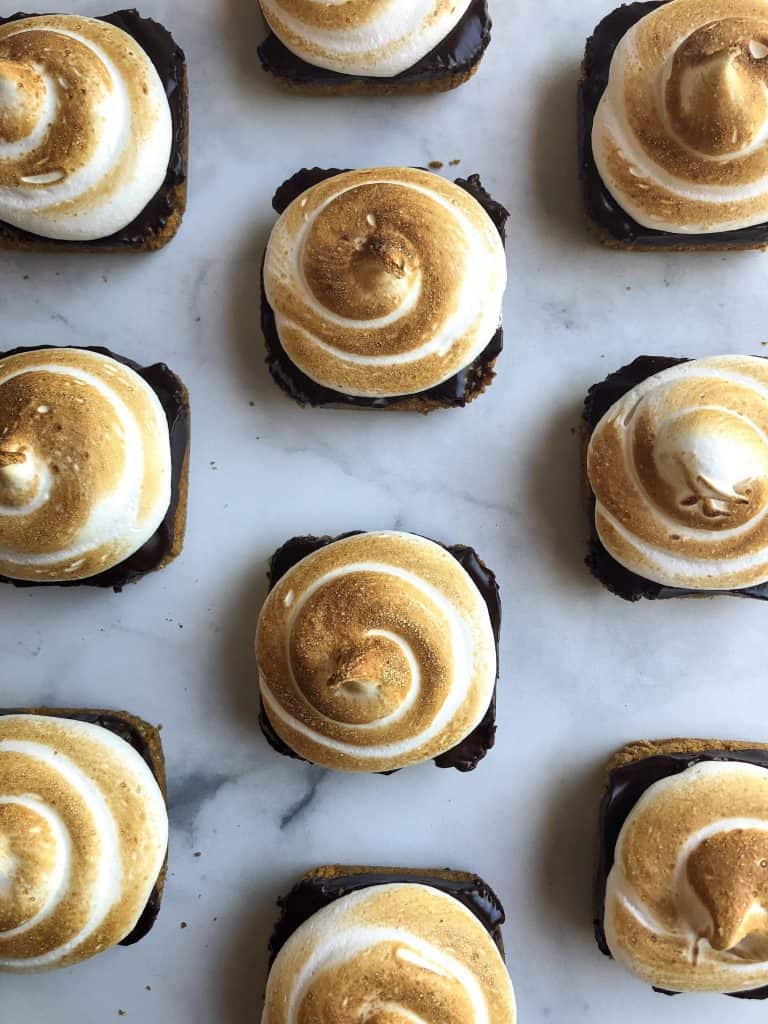 These are the perfect handheld dessert for fall! Mini campfire S'mores Pies are the perfect blend of sweet, crunchy and smooth!