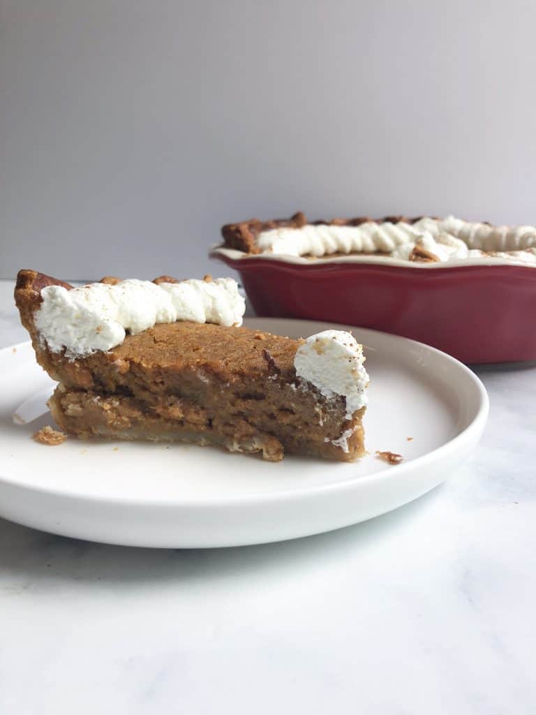 Sweet potato pie made with real sweet potatoes and homemade whipped cream is the perfect Thanksgiving treat!