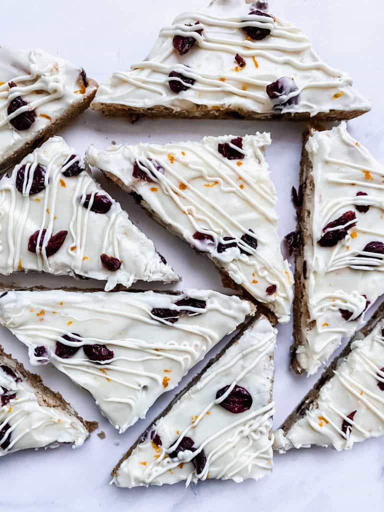 plate full of cranberry white chocolate cookie bars