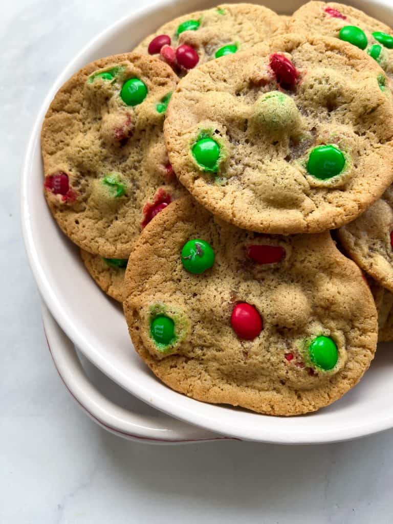 close up of M&M cookies on dish